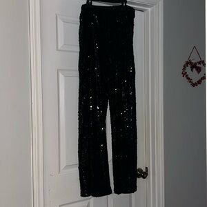 Black sequin bell bottoms